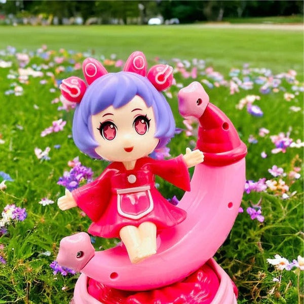 Rotating Moon Doll Toy With LED Lights &amp; Music – Adorable Crescent Moon Design, Universal Rotation, Safe for Kids 3+, Pink &amp; Purple Gift for Fun and Sensory Play (Random Color) - GlowLaa.com